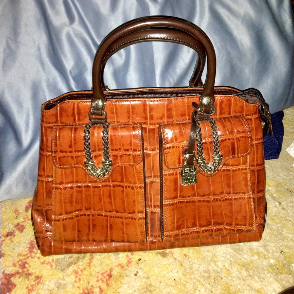 M.C. Satchel